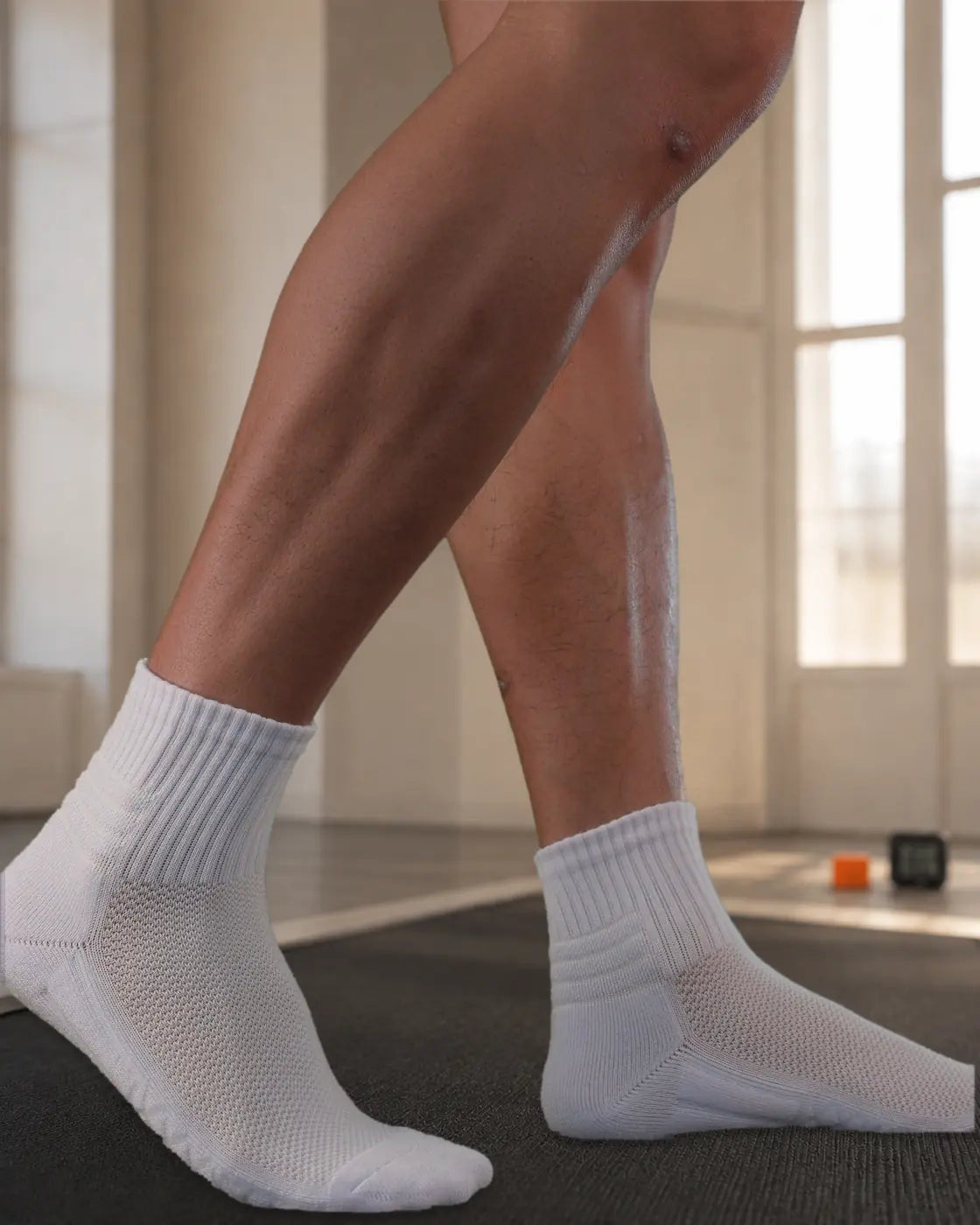 Photographed D7 ankle socks during a controlled wear step in a test room